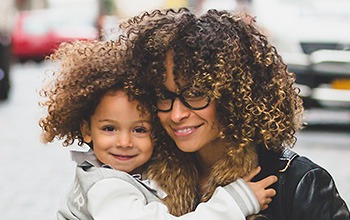 Smiling mother and daughter