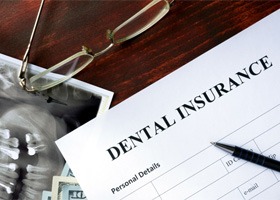 Dental insurance paperwork on a table