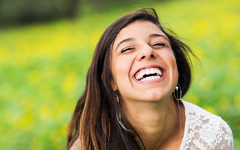 a patient with dentures smiling