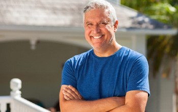 Man after dental implant post-op instructions in Rochester 