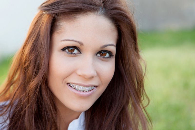 a young woman with braces.