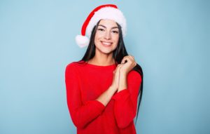 Woman with a healthy smile from dentist in Greece. 