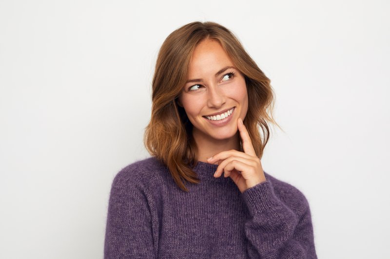 Patient smiling after getting veneers